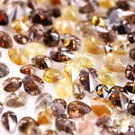 Natural fancy color pear shape rose cut diamond lot featuring mixed shades of brown, yellow and champagne loose diamonds, ideal for custom jewelry making, artisan rings, earrings and unique gemstone designs.