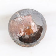 0.78 carat brownish black natural diamond round cut loose stone with subtle dual tone color blend