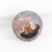 0.78 carat brownish black natural diamond round cut loose stone with subtle dual tone color blend