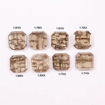 Emerald step cut lab grown diamonds with champagne tone and visible natural-style inclusions arranged in two rows on a white background.