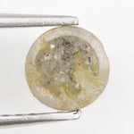 0.67 carat natural yellowish grey diamond round loose stone with subtle dual tone color