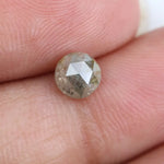 0.67 carat natural yellowish grey diamond round loose stone with subtle dual tone color
