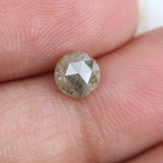 0.67 carat natural yellowish grey diamond round loose stone with subtle dual tone color