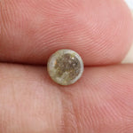 0.67 carat natural yellowish grey diamond round loose stone with subtle dual tone color