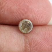0.67 carat natural yellowish grey diamond round loose stone with subtle dual tone color