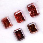 Five emerald cut lab grown fancy red pink diamonds displayed on white background, octagon step cut synthetic CVD diamonds in various deep red and blush tones for fine jewelry use.