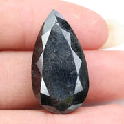 pear cut , grey black natural loose diamond , what does diamond represent in engagement ring symbolism and love