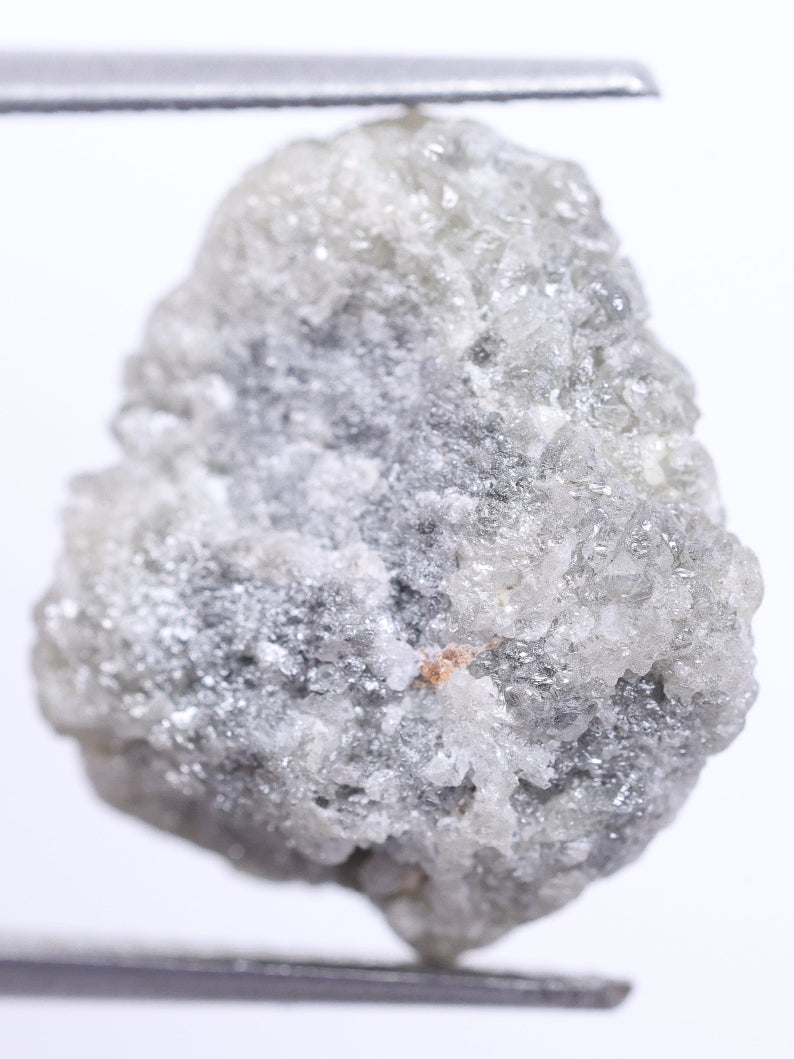 grey rough diamond on a white background