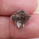 loose kite diamond with elongated pointed symmetry
