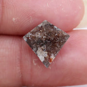 loose kite diamond with elongated pointed symmetry
