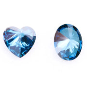 Oval and heart shaped fancy deep blue lab grown diamonds with brilliant faceting, showcasing vivid teal blue tones and VS clarity on a white background.