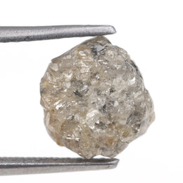 grey color raw uncut diamond engagement ring and raw uncut gems