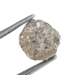 grey color raw uncut diamond engagement ring and raw uncut gems