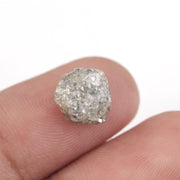 grey color raw uncut diamond engagement ring and raw uncut gems