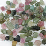 Natural rough tourmaline crystals multiple colors lot with green pink blue yellow and multicolor gemstones
