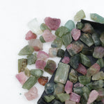 Natural rough tourmaline crystals multiple colors lot with green pink blue yellow and multicolor gemstones