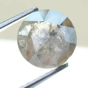 Fancy 1.25 carat grey white round cut loose diamond with natural inclusions, unique salt and pepper appearance, ideal for custom diamond rings and bespoke fine jewelry designs