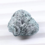 uncut blue diamond and uncut diamond ear studs with natural rough texture