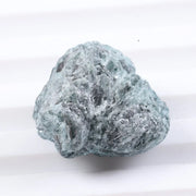 uncut blue diamond and uncut diamond ear studs with natural rough texture