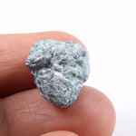 uncut blue diamond and uncut diamond ear studs with natural rough texture
