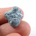 uncut blue diamond and uncut diamond ear studs with natural rough texture