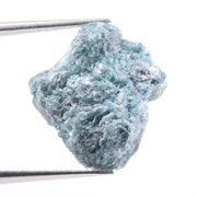 uncut blue diamond and uncut diamond ear studs with natural rough texture