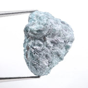 uncut blue diamond and uncut diamond ear studs with natural rough texture