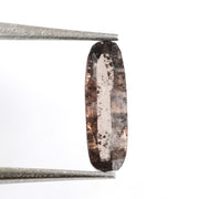 brown color diamond ring with sapphire baguettes