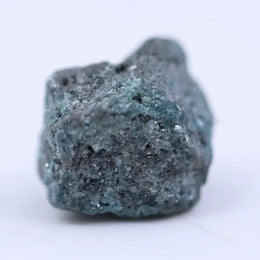 Natural unpolished rough diamond in raw form with earthy texture, ideal for custom jewelry and collectors