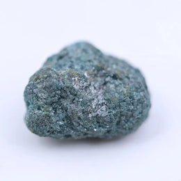 Real diamond rock in raw unpolished state showing natural crystal formation and rough surface