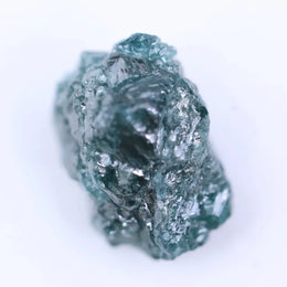 Raw yellow diamond in rough uncut form with natural golden hues and textured surface