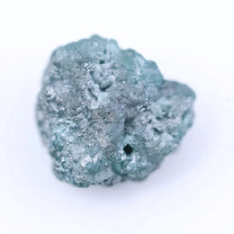 Uncut diamond jewellery showcasing raw diamond stones in rings and pendants with natural finish