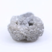 Salt and pepper diamond rough crystal with natural inclusions and rustic grey appearance.