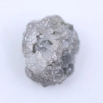 Uncut natural diamond with ash gray color and raw rough surface for handmade jewelry.