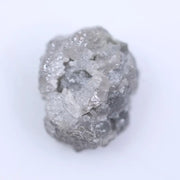 Uncut natural diamond with ash gray color and raw rough surface for handmade jewelry.