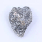 Uncut natural diamond with ash gray color and raw rough surface for handmade jewelry.