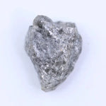Uncut natural diamond with ash gray color and raw rough surface for handmade jewelry.