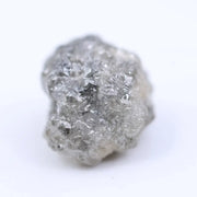 Loose grey diamond gemstone in radiant cut style for wedding ring setting.