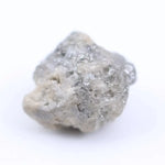 large uncut raw diamond showcasing natural rough diamond appearance grey rough diamond 