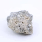 large uncut raw diamond showcasing natural rough diamond appearance grey rough diamond 