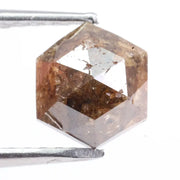 Earth-mined natural brown diamond stone photographed in high resolution, showing real color saturation and natural structure.