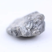 Rustic grey diamond gemstone with storm gray tone and natural inclusions.