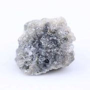 Rustic grey diamond gemstone with storm gray tone and natural inclusions.