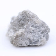 Rustic grey diamond gemstone with storm gray tone and natural inclusions.