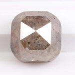 Natural brown diamond engagement ring featuring cushion cut design and genuine earth-mined stone. This image represents luxury, rarity, and emotional value