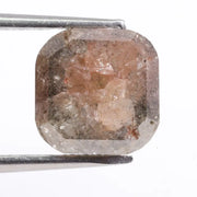 Natural brown diamond engagement ring featuring cushion cut design and genuine earth-mined stone. This image represents luxury, rarity, and emotional value