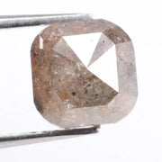 Natural brown diamond engagement ring featuring cushion cut design and genuine earth-mined stone. This image represents luxury, rarity, and emotional value