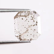 1.18 Ct black and white emerald cut lab created diamond with rectangular step facets and smooth sparkle