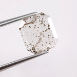 1.18 Ct black and white emerald cut lab created diamond with rectangular step facets and smooth sparkle