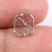 1.18 Ct black and white emerald cut lab created diamond with rectangular step facets and smooth sparkle